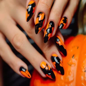 Hand With Orange Nails